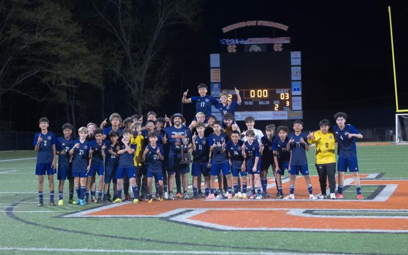 The Habersham middle school soccer team celebrates having just taken the title last week in Hartwell. HABERSHAM SOCCER