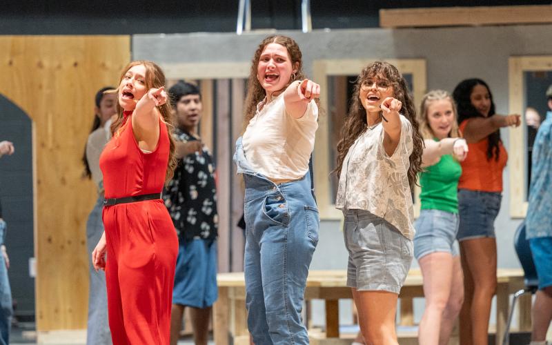 From left, Annalee Lewis, Abigail Taylor, and Ary Sanchez point toward the audience during one of their practice performances for Thursday’s opening night. “Mamma Mia!” will take the Habersham Central High School stage on Friday. The show will run through Sunday with a matinee show at 2 p.m. on the final day. The two-and-a-half hour show is filled with great vocals and choreography, with some funny moments mixed in. ZACH TAYLOR/Staff