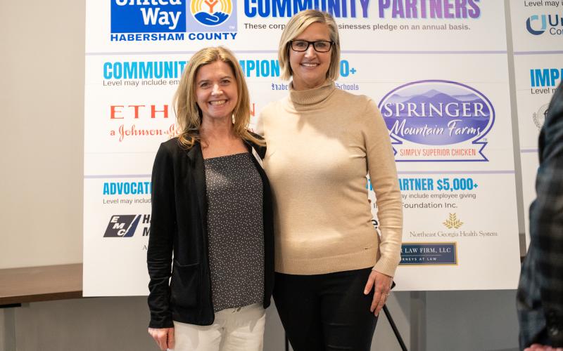 United Way Board Chairwoman Michelle Blackburn (left) stands with United Way President Candice Holcomb after the annual meeting last week. ZACH TAYLOR/Staff