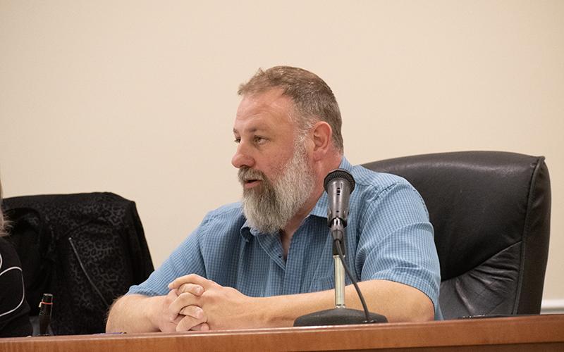 Baldwin City Councilman Maarten Venter asks some questions about the vacuum truck that the council is considering for purchase. Ultimately, the council decided to table the decision until they could further review their options. HANNAH CAUDELL/Staff