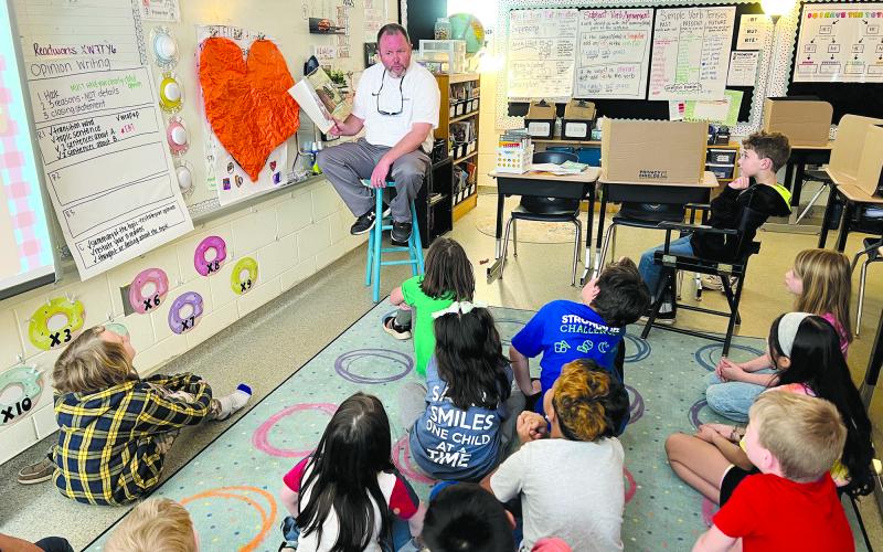 Assistant Superintendent Patrick Franklin reads to Emilee Waldon’s third grade class. SUBMITTED