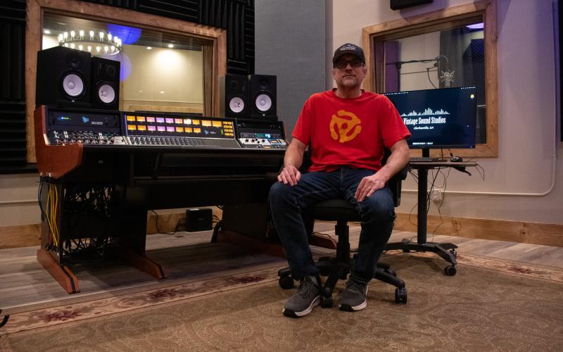 Stephen Wareham, owner of Vintage Sound Studios in Clarkesville, sits in the main studio of the brand new facility in front of the equipment he hopes to use to produce musical magic for new clients. HANNAH CAUDELL/Staff