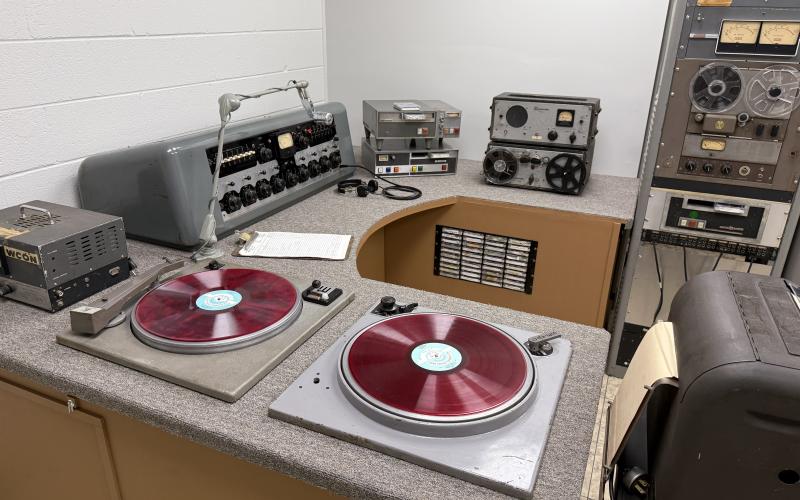 Mr. Foster led WCON to new heights amid the rapidly changing landscape of the industry. This photo depicts what the station’s equipment set up looked like back in its infancy ...