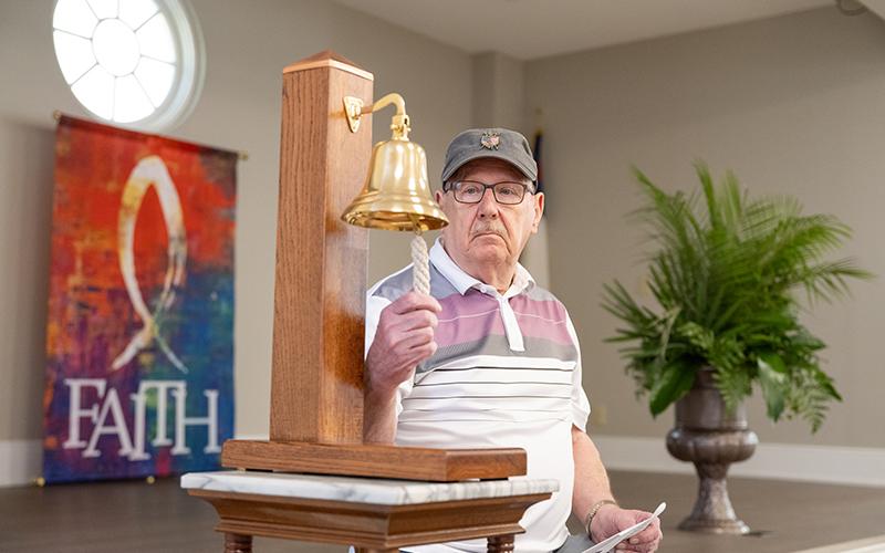 Wade Hasty rings a naval bell in honor of the fellow veterans who died over the last months. The moment marked the first of its kind at the Northeast Georgia Brotherhood of Veterans and Patriots breakfast. ZACH TAYLOR/Staff