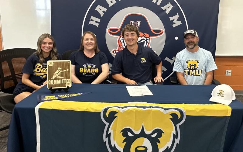 Spencer Frady made things official with Truett McConnell last week, signing with the Bears in the presence of his parents - Clint and Emily, and younger sister Reece. ADDIE MANEY/HCHS