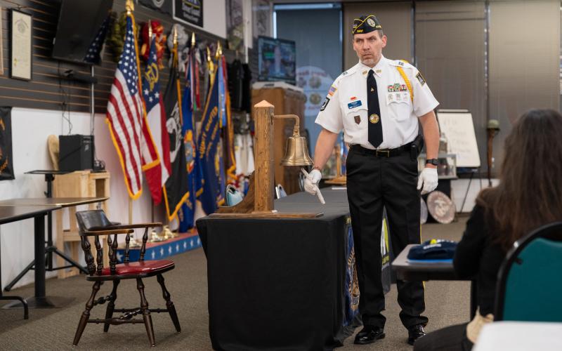 American Legion Post 84 Commander Jim Morgan rings the bell for the lives lost in wars around the world throughout American history. ZACH TAYLOR/Staff