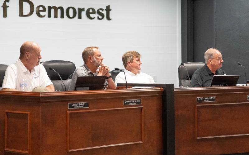 (Left to right) Councilman Jimmy Davis, Councilman Donnie Bennett, Mayor Jerry Harkness, and City Manager Mark Musselwhite listen to the new zoning ordinance amendments in the special called meeting on Monday. ZACH TAYLOR/Staff