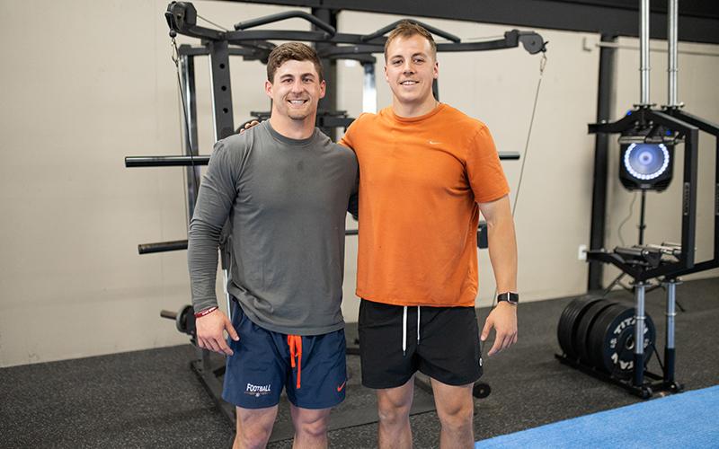 Co-owners Garrett Kinsey and Michael Luckie stand in the gym area at the new facility. The merger and location were destined to be, according to Kinsey. (Not pictured: Co-owner Andy Klein). ZACH TAYLOR/Staff