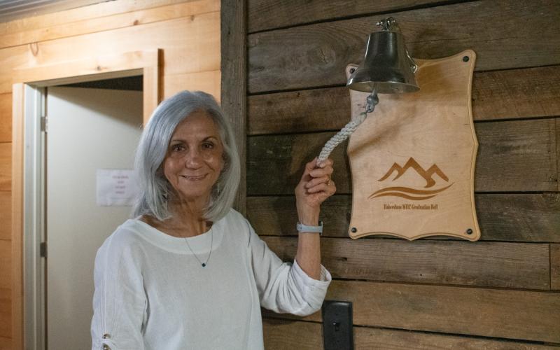 Myra Chandler rings the graduation bell at Mountain Education in Habersham. Chandler has celebrated her own graduation of sorts after retiring from Mountain Education after 16 years of counseling at the school, and a career in education and counseling that spans 54 years in total. Chandler is still involved with the school in a public relations role. HANNAH CAUDELL/Staff