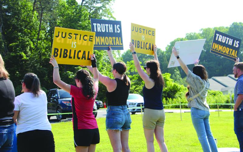 Last week, protesters on the Truett-McConnell University campus demanded an investigation into allegations of sexual abuse and harassment at the Christian school. DENISE ETHERIDGE/CNI News Service