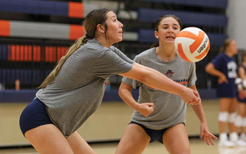 Habersham Central High School’s volleyball team gets in some practice on Tuesday, July 8. Above, Miley Ragan positions herself for a pass. (Landen Todd/Staff)