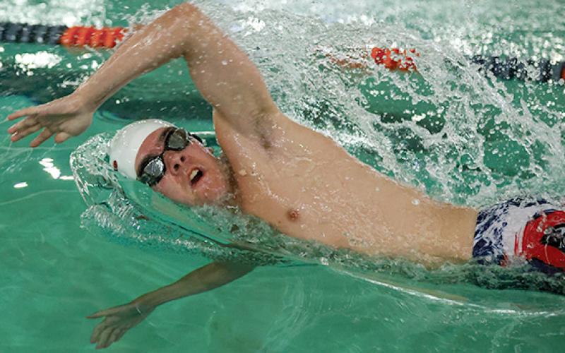 Habersham swimmer Parker Homa competes in Boys 18 &amp; Under 100 Yard Freestyle Class B during the GRPA State Qualifying Meet at Ruby C. Fulbright Aquatic Center on Friday, June 27.  (LANDEN TODD/Staff)