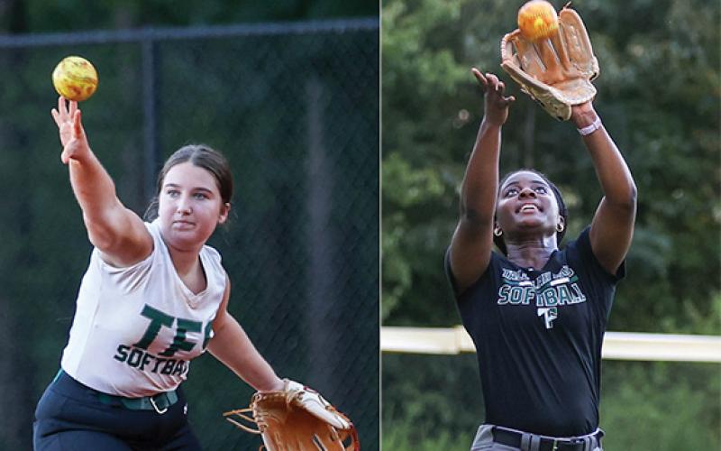 Ellie Shaw, left, throws the ball and Kaylin Pickett, right, catches one during softball practice at Tallulah Falls School on Tuesday, July 29. (Landen Todd/Staff)