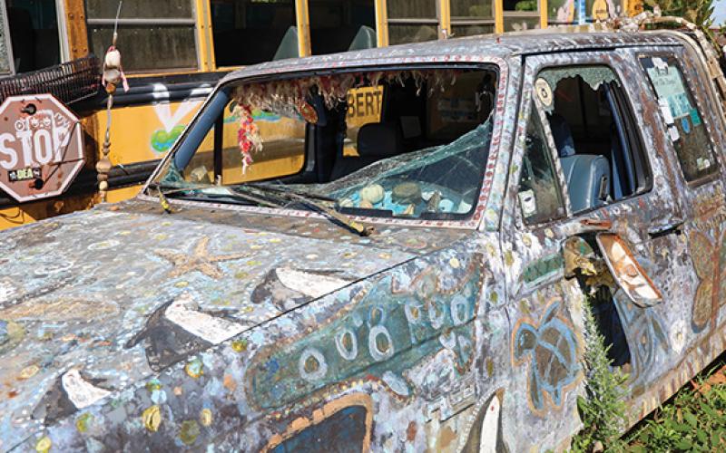 The front windshield and door windows of a vehicle in the School Bus Graveyard has been damaged after a vandalism attempt last Wednesday. (Landen Todd/Staff)