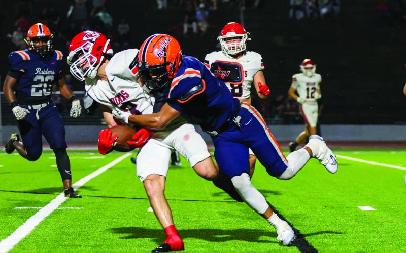 Habersham Central junior Tay Spencer (9) makes a tackle during a high school football game between Stephens County and Habersham Central at Raider Stadium on Friday, Aug. 15. The Raiders won 27-3. (Landen Todd/Staff)