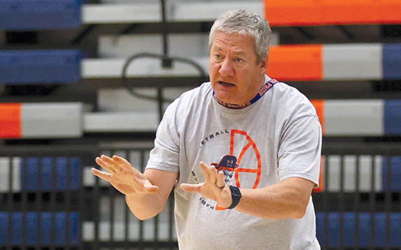 Girls Basketball Head Coach Bill Bradley, seen above at the girls basketball camp in June, is resigning from his role as girls basketball head coach.  (Landen Todd/Staff)