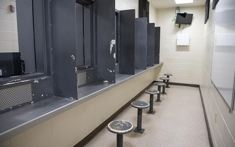 The old visitation room now serves as a classroom, courtroom, legal counsel room, and virtual visitation room due to limited space in the current jail. A rough schematic of the new jail outlines a multi-purpose room dedicated to activities such as GED courses, for which Major Leslie Hendrix is currently being trained to teach. (Zach Taylor/Staff)