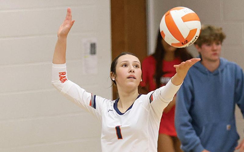 Habersham Central junior Miley Ragan (1) serves the ball during a volleyball match between Rabun-Gap and Habersham Central on Thursday, Aug. 28. (Landen Todd/Staff)