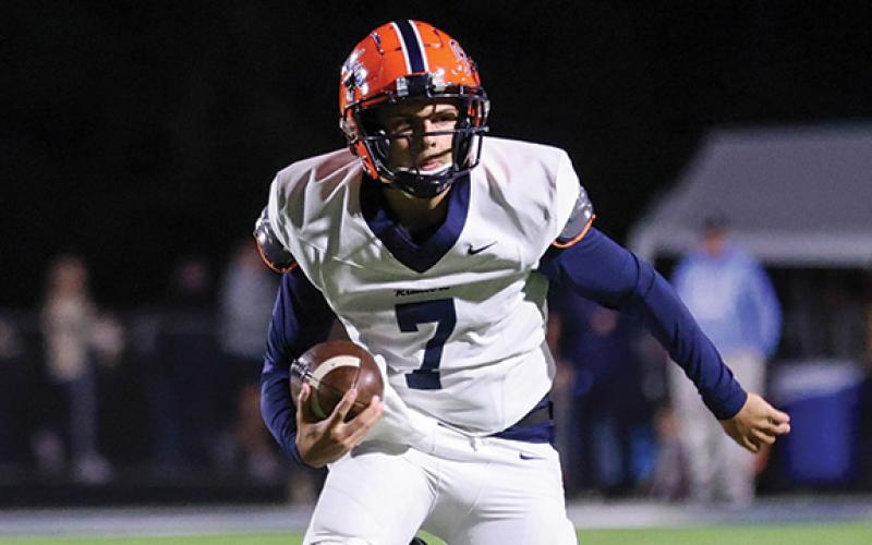 Habersham Central junior quarterback Paris Wilbanks (7) runs with the ball during a football game between Habersham Central and Apalachee at Apalachee Wildcats Football Stadium on Friday, Oct. 24. (Landen Todd/Staff)