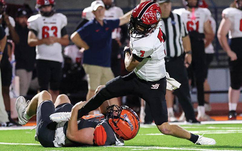Habersham Central senior lineman Jackson Adams (18) sacks the quarterback during a game between Winder-Barrow and Habersham Central at Raider Stadium on Friday, Sept. 26. (Landen Todd/Staff)