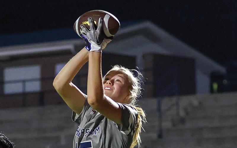 Habersham Central sophomore receiver Macy Huff (15) snags the ball for an extra point during a flag football game at Raider Stadium on Wednesday, Nov. 19. (Samantha Sinclair/Staff)