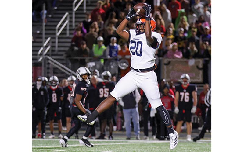 Habersham Central junior linebacker Griffin Cunningham (20) snags an interception during a football game between Habersham Central and Jackson County for the region championship at Panther Stadium on Friday, Oct. 31. (Landen Todd/Staff)