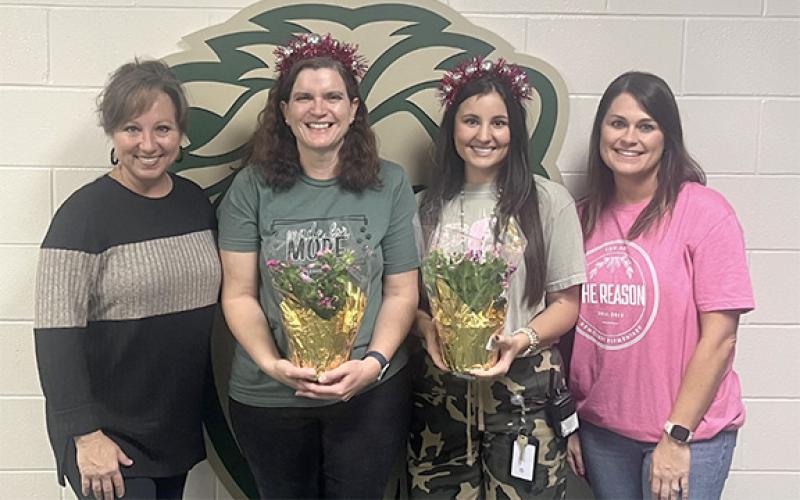 Principal Lana Jones and Assistant Principal Kellie Cash celebrate ennifer Reynolds and Chandler Herrin as Demorest Elementary teacher and support person of the year. (Submitted)