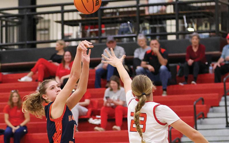 Habersham Central sophomore Sadie Chambers (13) shoots the ball during the region tournament at Winder-Barrow High School on Thursday, Feb. 19. (Landen Todd/Staff)