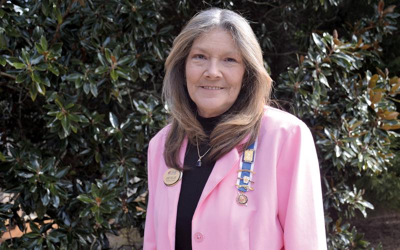 Janet Keller is one of the Tomochichi Chapter’s newest members. Her pins include one for her Revolutionary War ancestor, Jacob Roller of Pennsylvania, and a lantern pin in honor of the chapter’s founder, Addie Bass. (Samantha Sinclair/Staff)