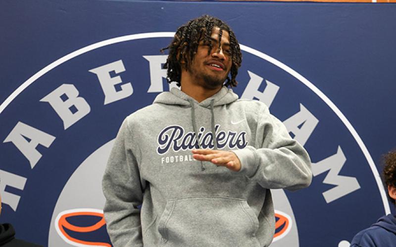 Habersham Central senior running back Donnie Warren gives a speech at his signing ceremony at Habersham Central High School on Wednesday, Feb. 18. (Landen Todd/Staff)