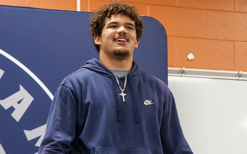 Habersham Central senior offensive lineman and wrestler Javonte Bowen gives a speech at his signing ceremony at Habersham Central High School on Wednesday, Feb. 18. (Landen Todd/Staff)