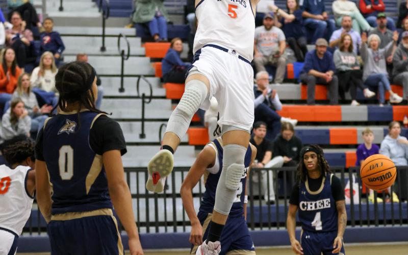 Habersham Central senior forward Jake Mihalick (5) dunks the ball during a basketball game between Apalachee and Habersham Central. Mihalick has committed to play basketball with North Greenville University. (LANDEN TODD/Staff)