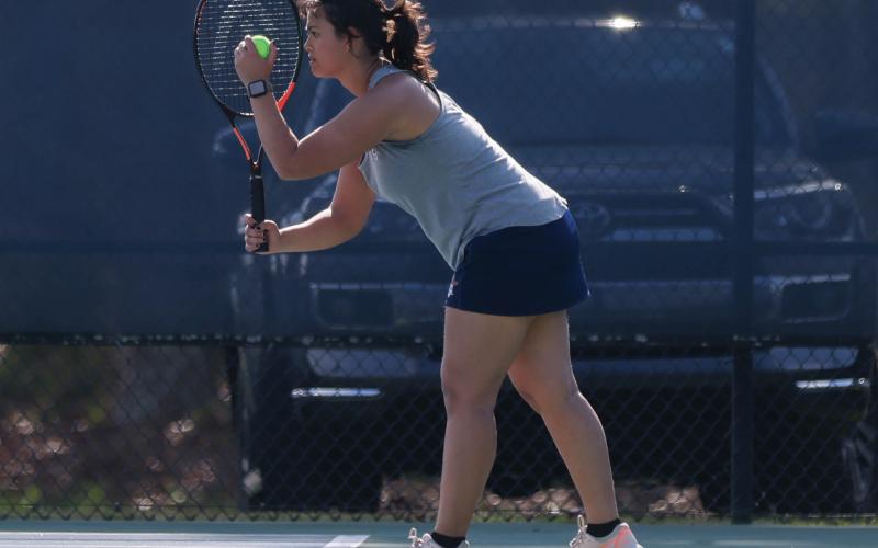 Habersham Central senior Zaelice Phasavang prepares to serve the ball during a match between Jackson County and Habersham Central at Habersham Central High School on Thursday, March 26. (Landen Todd/Staff)