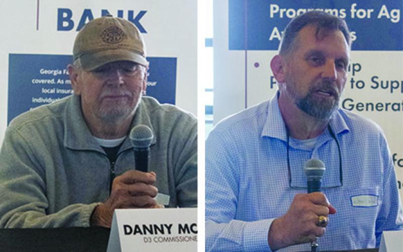 County Commission District 3 candidates Danny McClellon, left, and Jason Smith, right, answer questions on issues of agribusiness, taxpayer dollars and the Unified Development Ordinance. (Hannah Caudell/Staff)