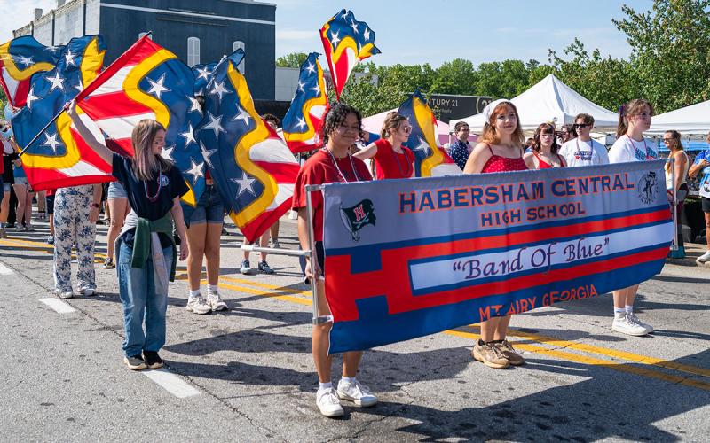 The Habersham Central Band of Blue marches up Washington Street in the Mountain Laurel Festival Parade. (Zach Taylor/Staff)