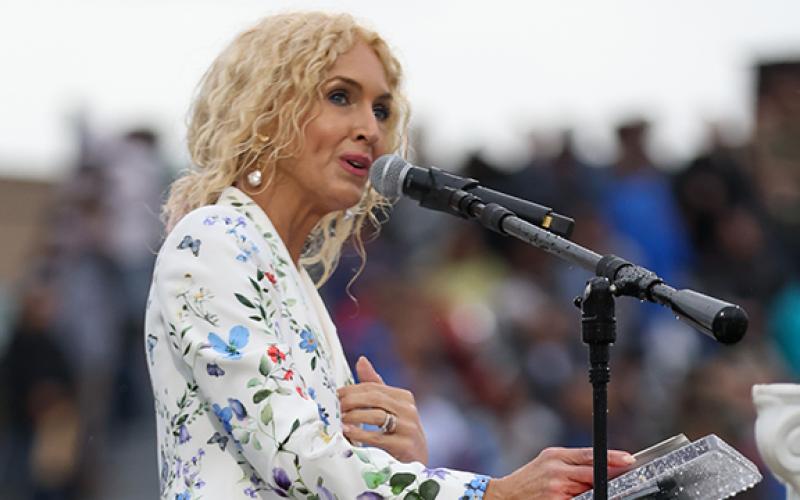 Country singer Kimberly Schlapman speaks at the Habersham Central High School graduation ceremony at Raider Stadium on Friday, May 22. (Landen Todd/Staff)