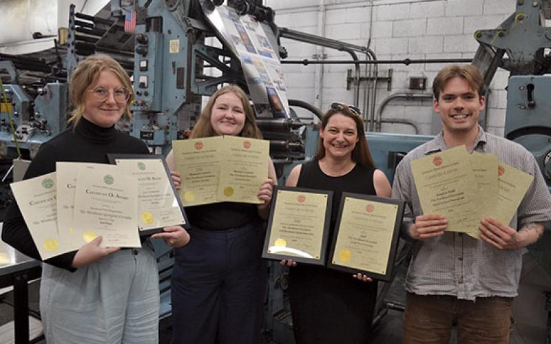 Designer Kristen Adkinson, Staff Writer Hannah Caudell, Editor Samantha Sinclair and Sports Writer Landen Todd all picked up awards at the Georgia Press Association Better Newspaper Contest Friday. (Alan NeSmith/Staff)