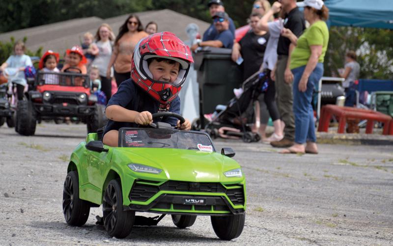 Ivan Duran steers his car to the finish line to win the electric car race. (Samantha Sinclair/Staff)