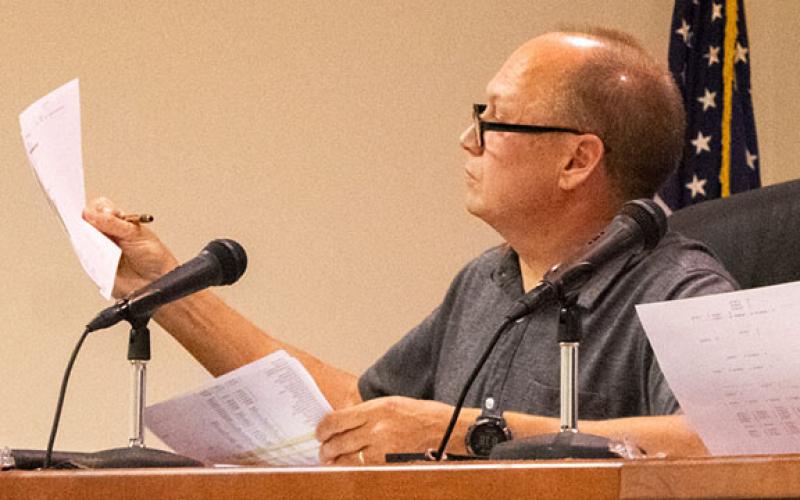 Baldwin Councilmen Joe Elam reviews preliminary budget numbers for the city.  (Hannah Caudell/Staff)
