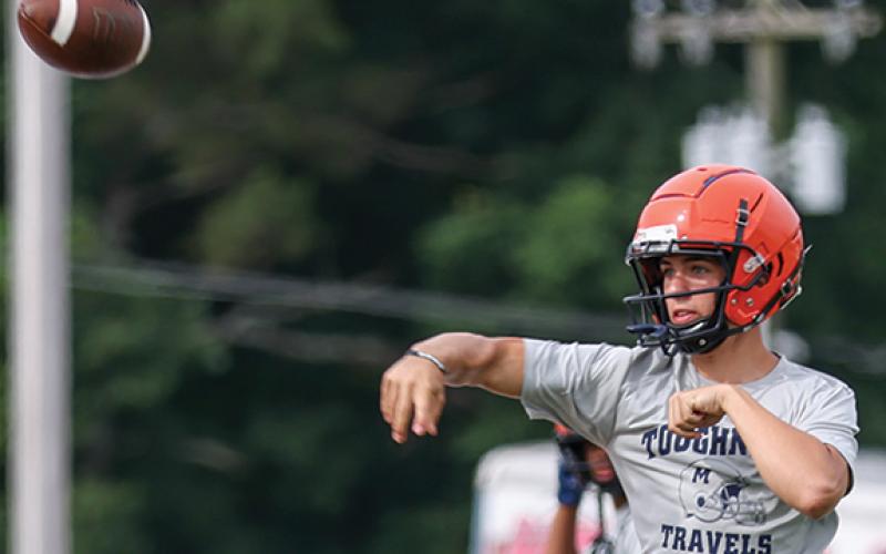 Habersham Central rising junior Trent Muenzer makes a jumping throw during a football practice at Raider Stadium on Monday, June 8. (Landen Todd/Staff)