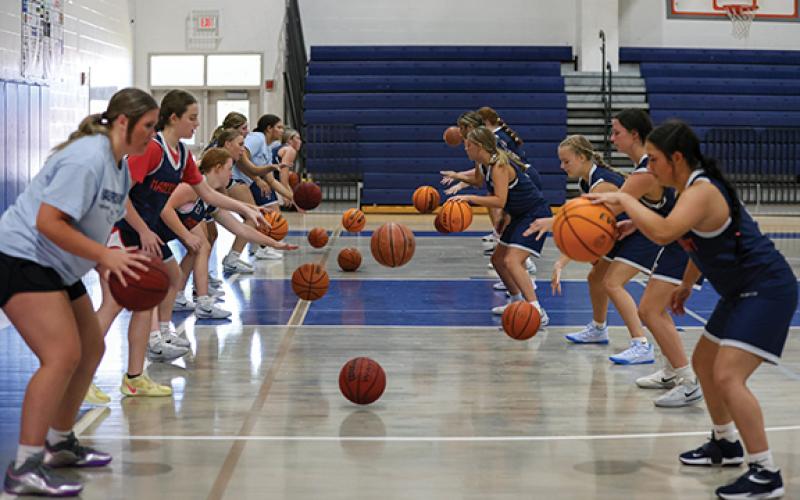 Habersham Central basketball players work on drills during a basketball practice at Hilliard A. Wilbanks Middle School on Monday, June 15. (Landen Todd/Staff)