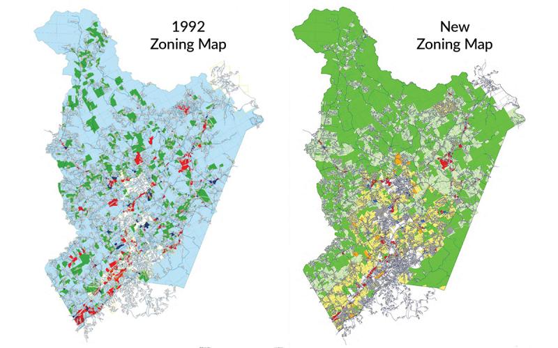 Under the previous zoning, data centers were allowed in Medium Intensity and High Intensity zones — marked dark blue and red on the 1992 map — and subdivisions with unlimited one-acre lots were allowed in Light Intensity zoning district, or all light blue areas. The newly-approved zoning map limits data centers to General Industrial zoning districts, marked in grey, and creates a minimum lot size of three acres in Agricultural zoning district, marked by green on the map. (Submitted)