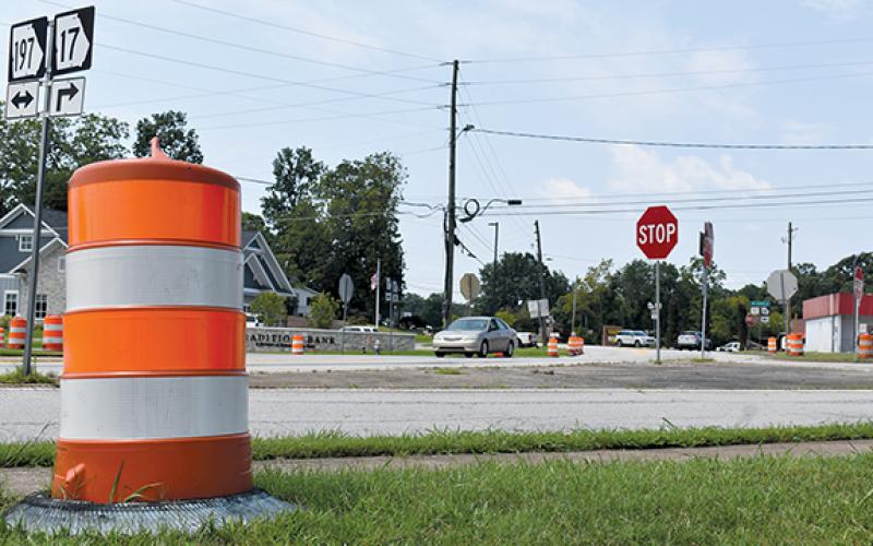 Traffic cones begin to appear as the start date for construction on the roundabout approaches. (Noah Ansley/Staff)