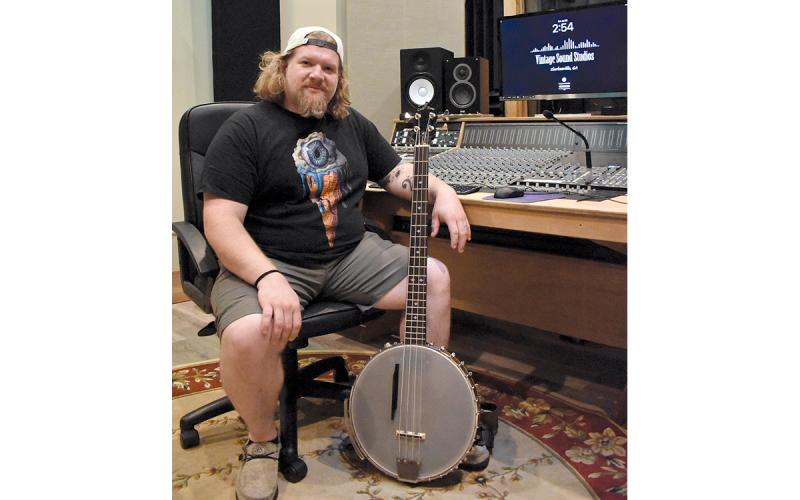 Sid Porter poses for a photo at Vintage Sound Studio in Clarkesville. (Noah Ansley/Staff)
