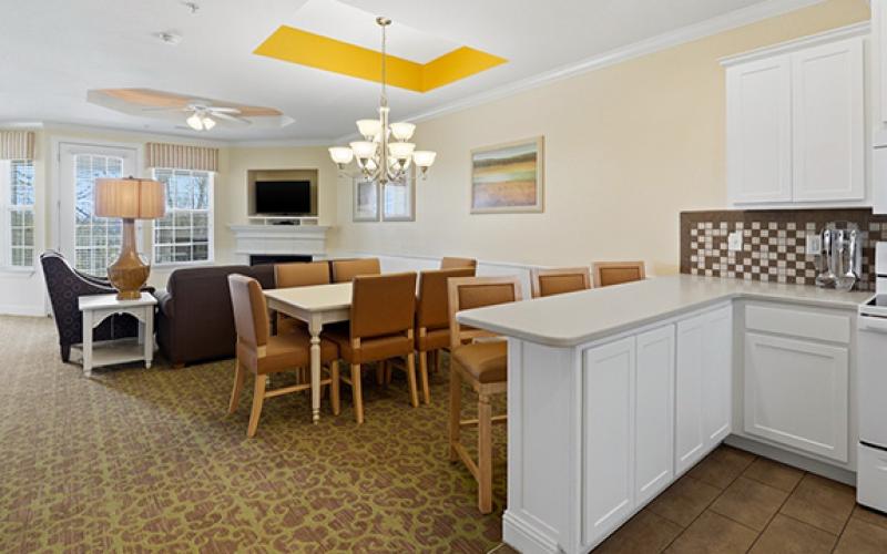 A dining room and kitchen is shown in one of the presidential penthouses, which are now long-term rentals at the Apple Mountain Golf Club and Resort, recently purchased by BQA 4 LLC. (Submitted)