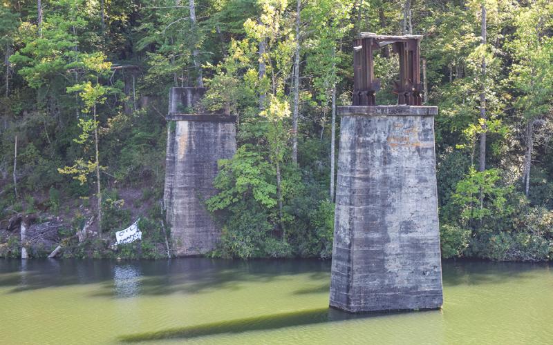 A sign protesting eminent domain on the Irvins’ property sits on the shoreline of their property. Demorest plans to draw water at the site and build a water treatment plant. (Hannah Caudell/Staff)