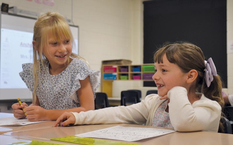 Asher June Black and Ada Plum were excited to see they were in Davina Presley’s class when Plum entered the classroom on the first day at Level Grove Elementary. The girls chatted as they colored. (Samantha Sinclair/Staff)