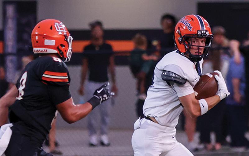 Habersham Central senior wide receiver Drake Roland (19) runs with the ball during the football game between Habersham Central and Hart County at Herndon Stadium on Friday, Aug. 21. (Landen Todd/Staff)