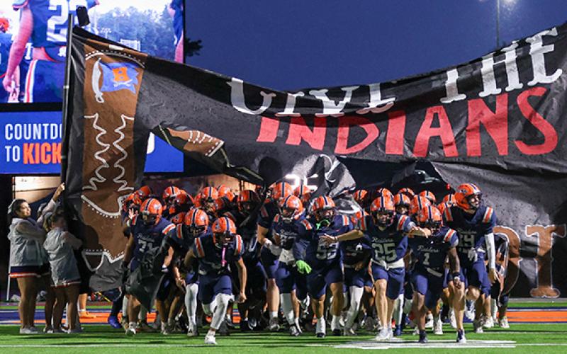 Habersham Central players run on to the field during last year’s game against Stephens. (Landen Todd/Staff)