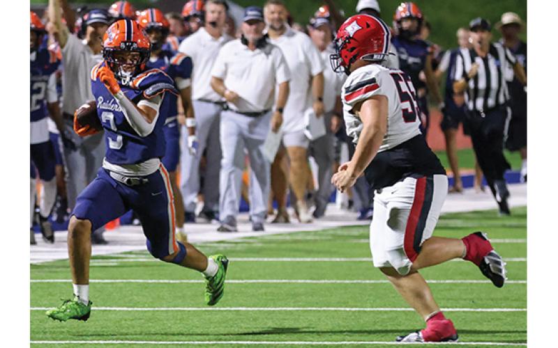 Habersham Central senior linebacker CJ Davis (3) runs with the ball after intercepting it during the football game between Stephens County and Habersham Central at Raider Stadium on Friday, Aug. 28. (Landen Todd/Staff)
